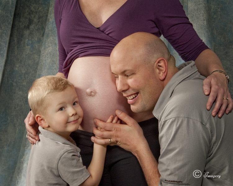 Professional Photo of Child and Husband with Pregnant Woman
