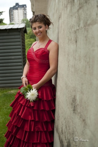 Professional Photo of Graduate in Red Dress